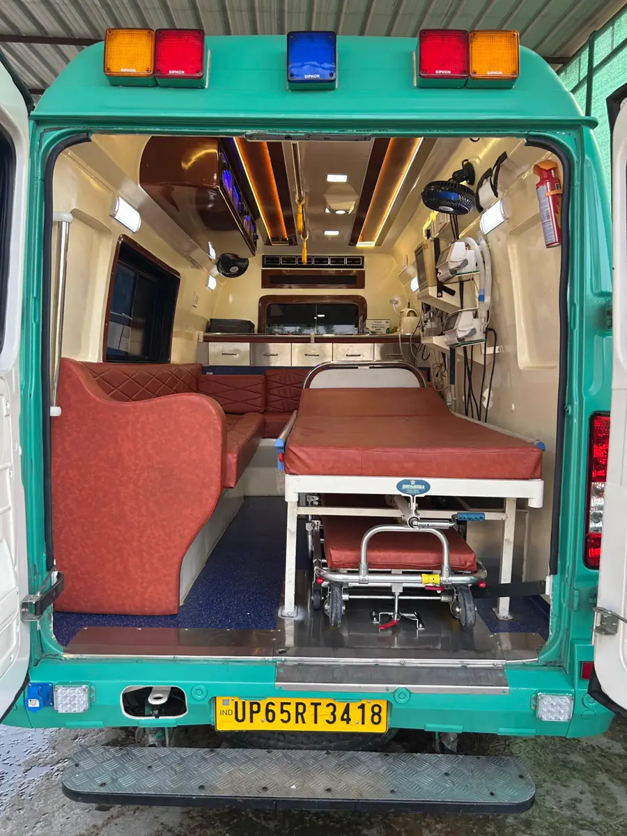 Inside a JMB ambulance with patient stretcher and medical fittings